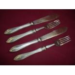 Two pairs of silver plated LNER railway carriage fish knives and forks