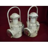 Pair of BR white painted railway lamps with bullseye glass lenses stamped BR to the necks