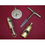 Two rail guard whistles, one stamped NER a NER & Co door key and part of a railway regulator