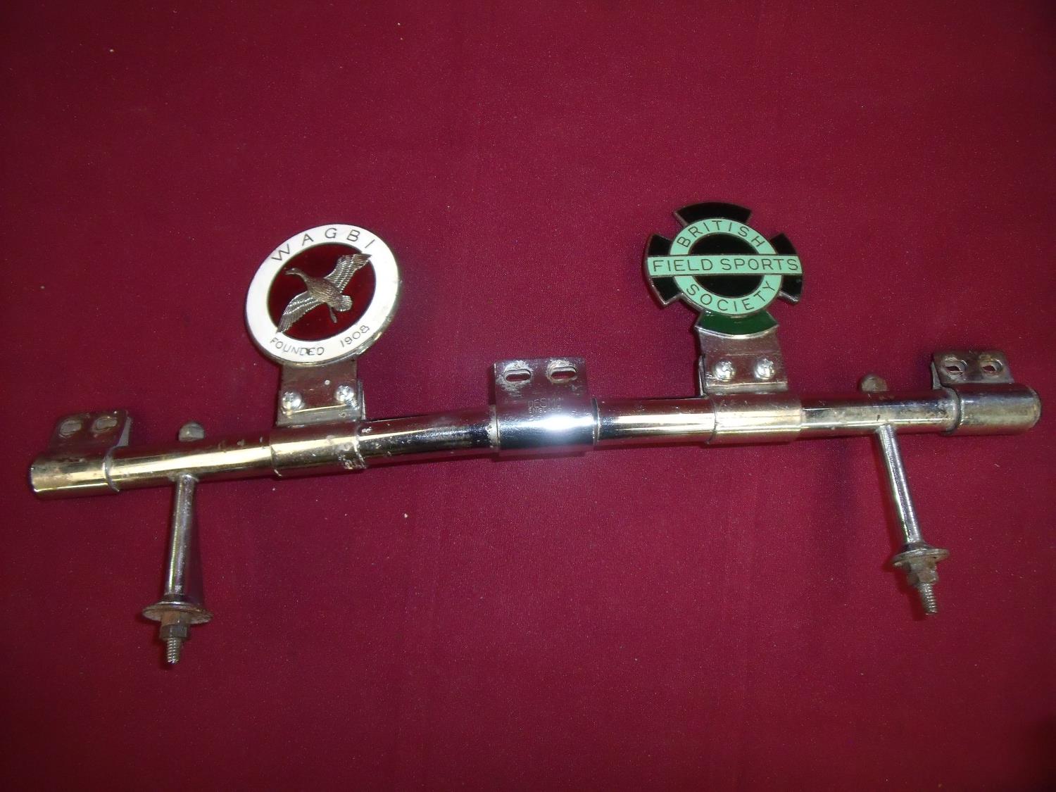 Chromed vehicle bumper bar by Desmo England mounted with two enamel sporting badges British Field