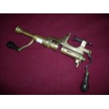 Bartram brass loading tool with turned wood handles