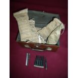 Rectangular tin with a small selection of dummy rounds, various tools and WWII period Sorbsil silica