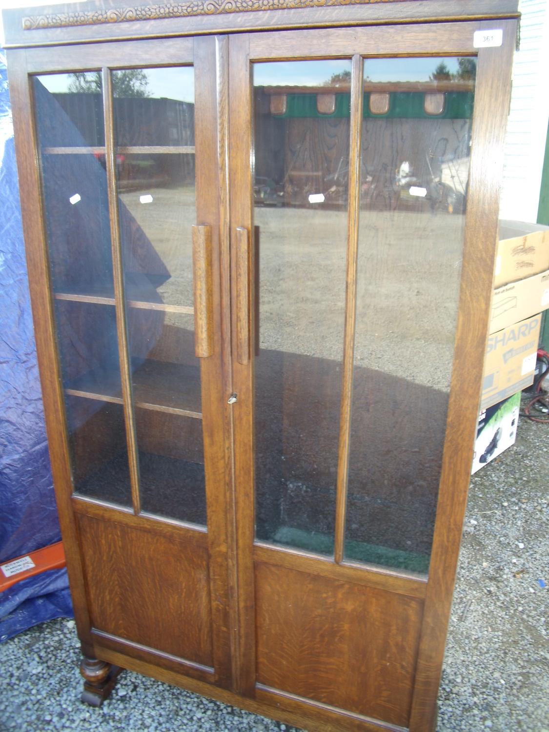 1930s oak display cabinet with side fitted gun display cabinet enclosed by two glazed doors (91cm