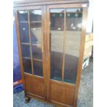 1930s oak display cabinet with side fitted gun display cabinet enclosed by two glazed doors (91cm