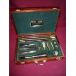 Mahogany cased William Powell 12 bore shotgun cleaning kit and tool set in fitted case with William