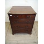 Mahogany deep chest of small proportions with fall front above two drawers on raised bracket feet (