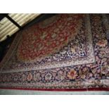 Red ground Keshan rug (280cm x 200cm)
