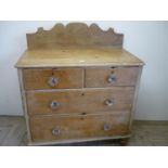 Victorian pine chest with glass handles and raised shaped back