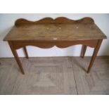 Victorian pine aide table with a raised and shaped back