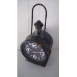 Modern clock in the form of a railway hand lamp (45cm high)