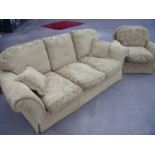 Large three seat sofa and matching armchair