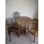 Early 20th C oak drop leaf gate leg table, four wheel back chairs and a rustic elm country chair