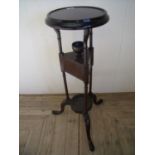 Dark mahogany Wig type stand with circular top and two central drawers above under tier on turned