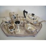 Silver plated three piece tea service and a four piece silver plated coffee service on silver plated