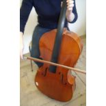 Junior Cello with soft carry case (length of body at the back 69cm) with associated bow with ivory