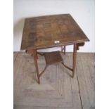 Unusual Arts & Crafts period two tier occasional table with parquetry top