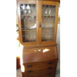 Arts & Crafts period oak bureau bookcase with leaded glass windows