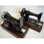 Two vintage cased sewing machines