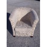 Tub chair on beige pattern damask