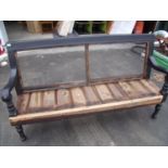 Victorian hall bench with ebonised type frame and turned supports, for re-upholstery (width 180cm)