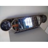 Modern wall mounted mirror and clock set in the form of a car grill (width 108cm)