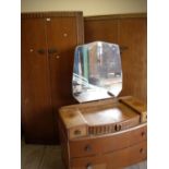 Early 20th C oak three piece bedroom suite comprising of a double wardrobe, single wardrobe and a
