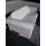 Three seat settee in cream pattern upholstery