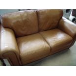 Tan leather two seat sofa (width 168cm)