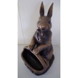 Composite figure of a rabbit and basket planter (46cm high)