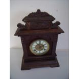 Walnut cased striking mantel clock by Ansonia Clock Co New York USA (45cm high)