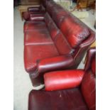 Three piece wingback leather suite comprising of three seat sofa and a pair of matching armchairs