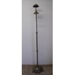 Early 20th C brass telescopic standard lamp with three claw feet