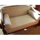 Regency style mahogany framed two seat settee on turned supports and bolster cushions (width 130cm)