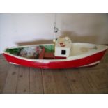 Large handmade wooden model of a fishing boat