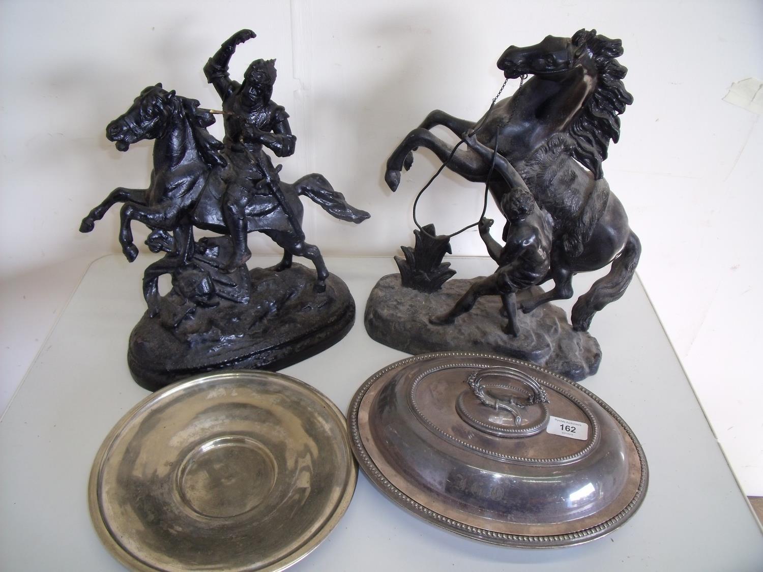 Two Victorian spelter figures on horseback, a silver plated baking tray and a silver plated dish