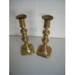 Pair of 19th C brass candlesticks (20cm high)