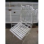 Folding metal outdoor table and set of matching folding chairs