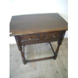 Oak single drawers side table with rectangular top with turned and carved detail (79cm x 50cm x