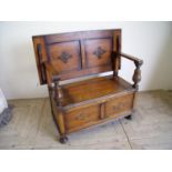 Early 20th C oak monks bench with applied carved detail