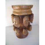 Carved hardwood 'Many Faced' stool (47cm high)