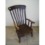 Late Victorian beech farmhouse style slat back armchair on turned supports and double H shaped under