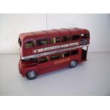 Metal painted figure of a London double decker bus (length 27cm)