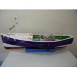 Large handmade wooden model of a fishing coble (approx length 94cm)