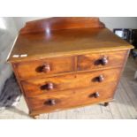 Small Victorian mahogany chest of two short above two long drawers on raised turned supports (92cm x