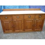 A large pine sideboard with raised back (width 205cm)