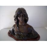 Art Nouveau bronzed bust of a young woman. signed to the back A. Govy on marble base (35cm high)