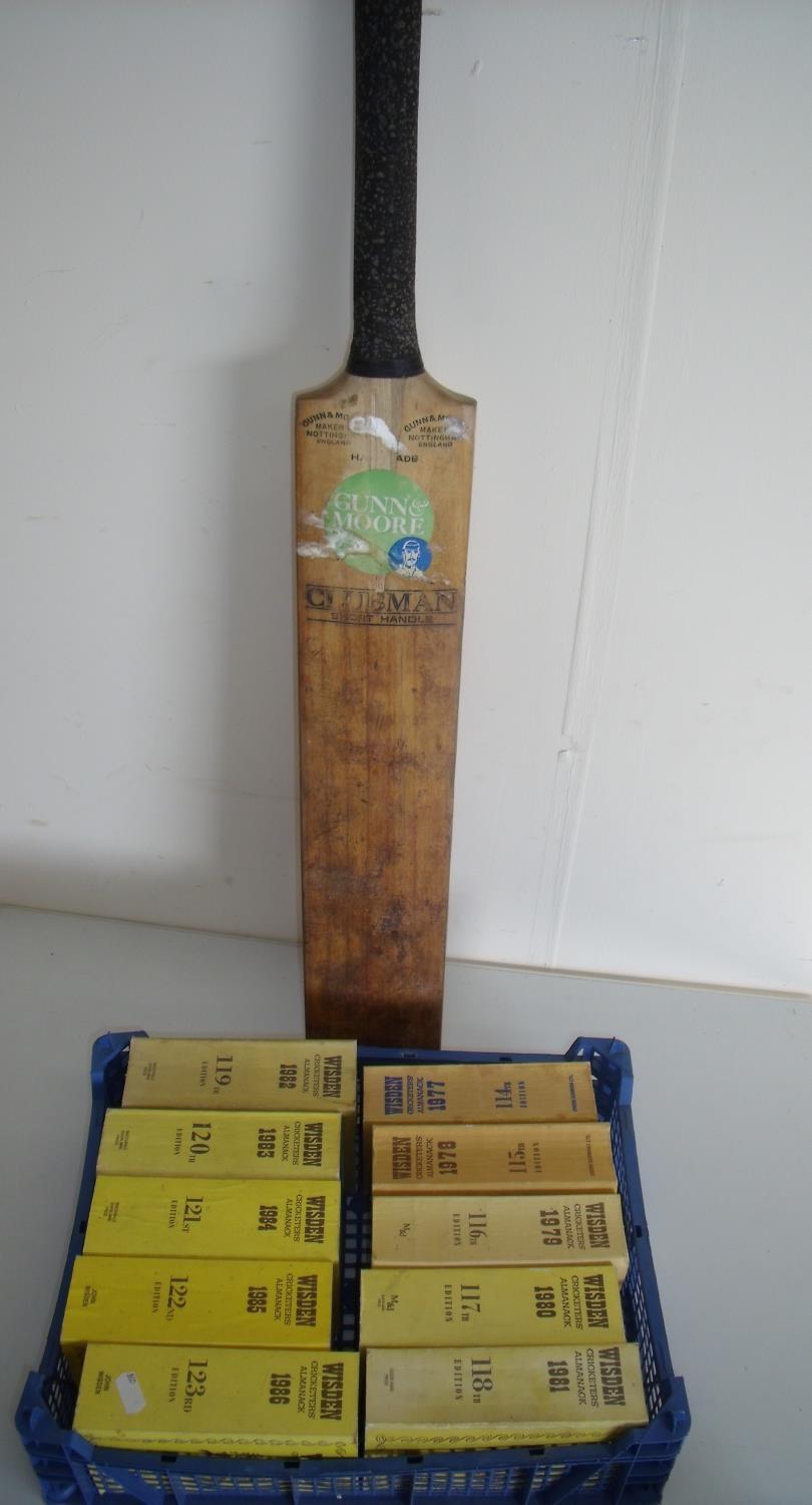 Vintage Clubman cricket bat and a collection of Wisden Cricketers Almanack from 1970/80s