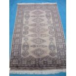 Beige ground Bokhara rug (195cm x 126cm)