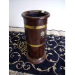 Mahogany cannon barrel brass mounted stick stand with liner and twin lion mask handles (diameter