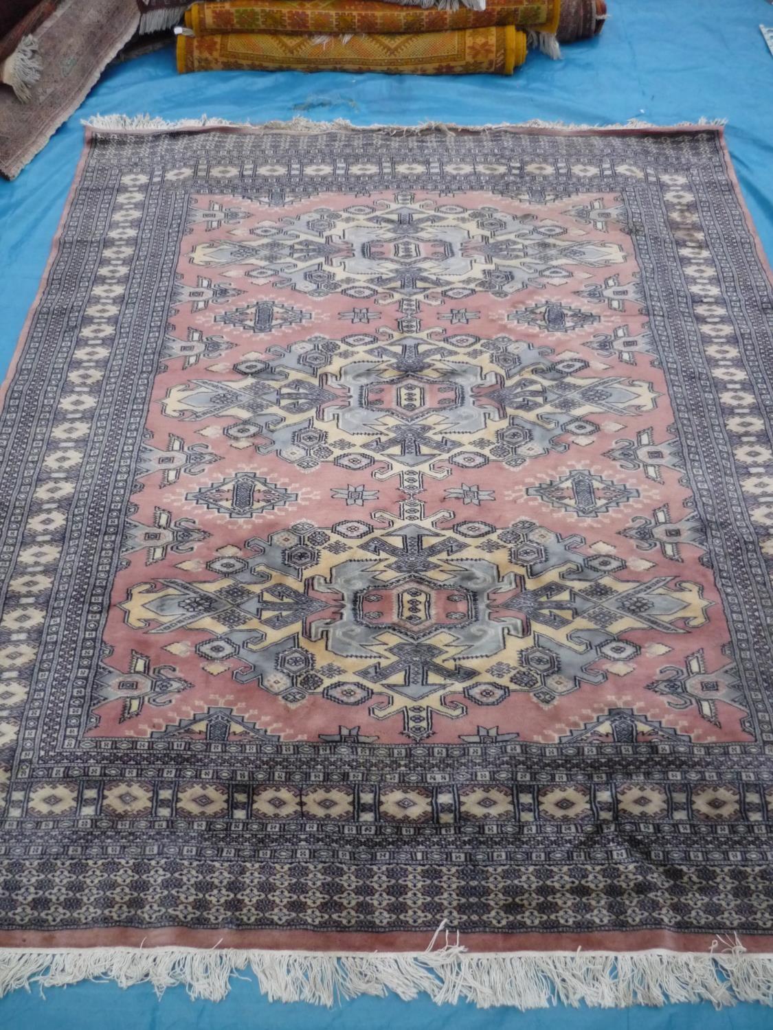 Pink ground Bokhara rug (235cm x 190cm)